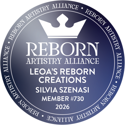 Reborn Artistry Alliance member badge: Silvia Szenasi, member #730, 2026